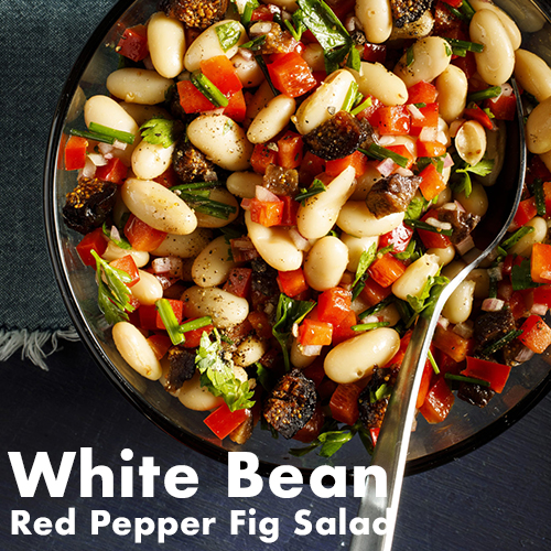 bowl of white beans, red pepper, and figs