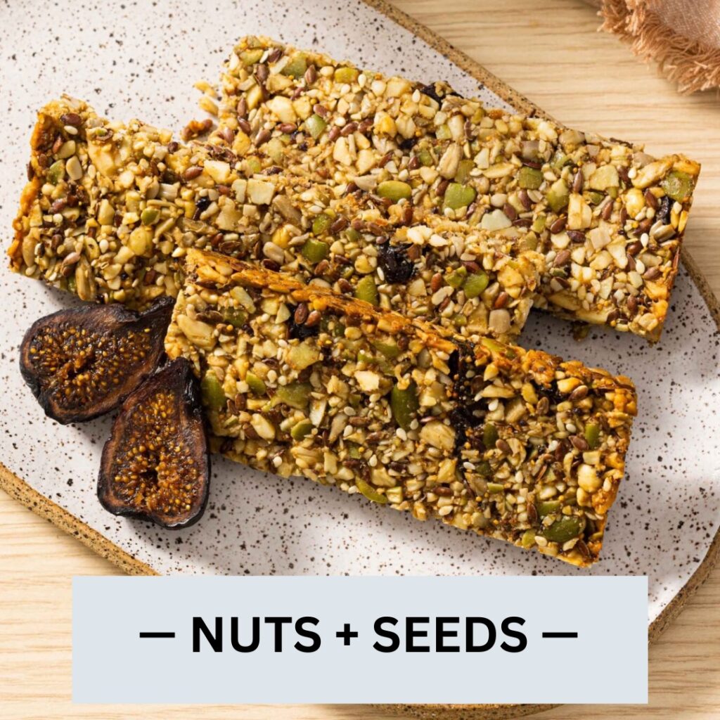 paleo nut and seed granola bars on a speckled tray