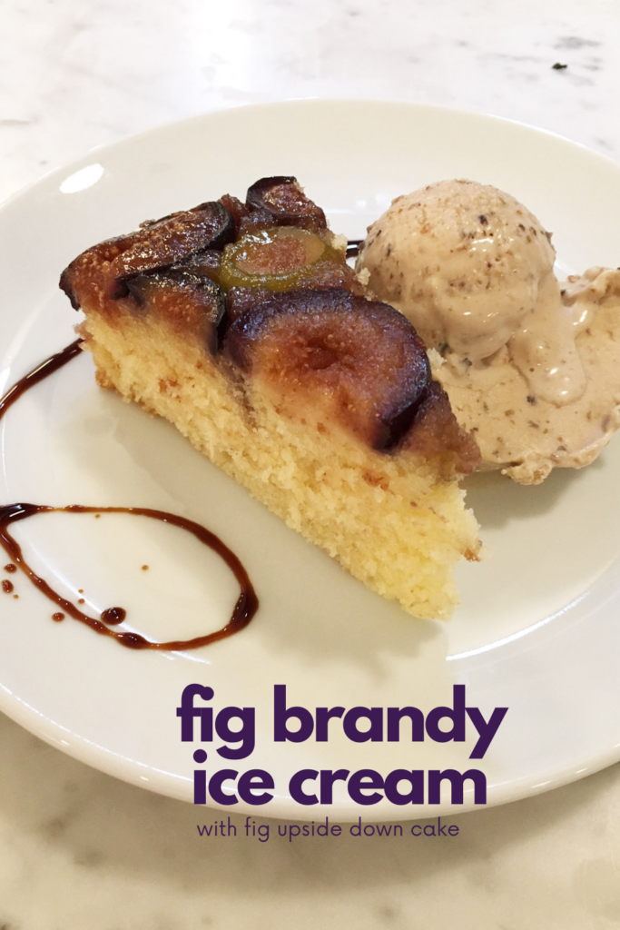 Slice of fig upside down cake with a scoop of fig brandy ice cream