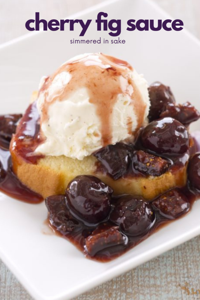 Pound cake slice topped with fig and cherry sauce with vanilla scoop of ice cream