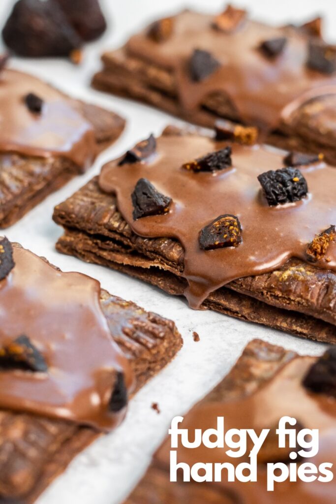 fudgy fig hand pies on a sheet of parchment paper | baking pie with figs